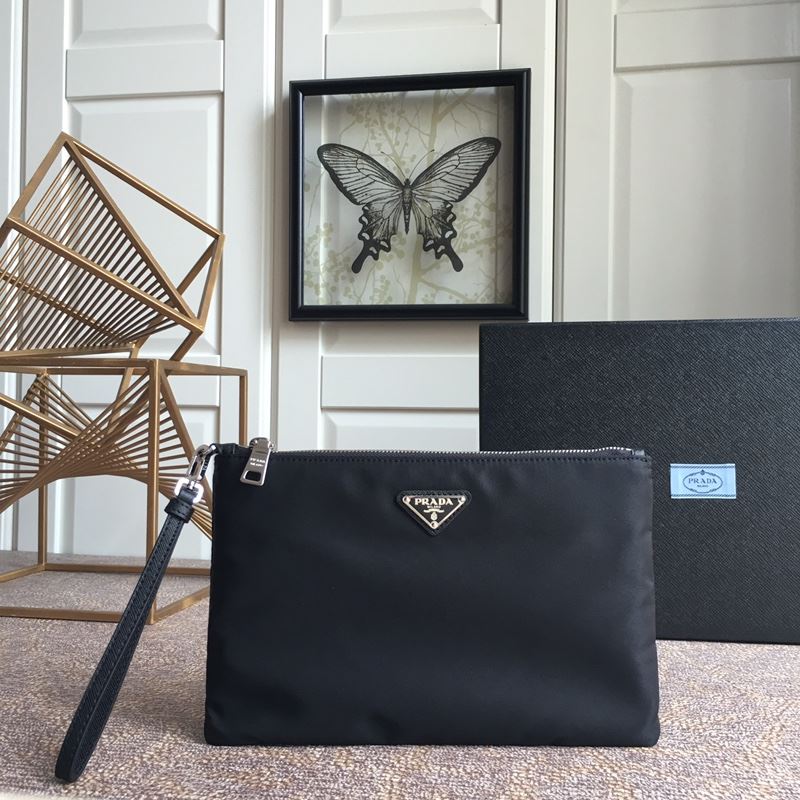 Pra*a clutch bags